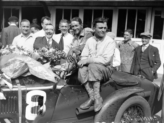 A private Alfa Romeo in front of the Scuderia - LAT Archive